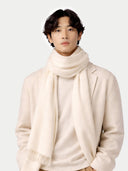 Organic Colour Cashmere Fringed Scarf Off White worn by model, detail view on white background