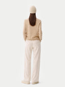 Cashmere € 99 Hat & Sweater Set Beige worn by model, back view on white background