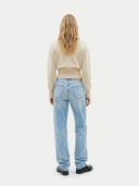 Women's Beige Cashmere Cinched-Waist Sweater worn by model, back view on white background