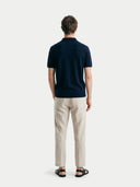 Men's Navy Cashmere Silk Half-Zip Polo Top worn by model, back view on white background