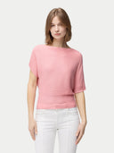 Women's Short Dolman Sleeve Cashmere Sweater Pink Icing  worn by model, detail view on white background