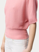 Women's Short Dolman Sleeve Cashmere Sweater Pink Icing  worn by model, detail view on white background
