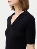 Cashmere Silk Women's Polo Shirt Black   worn by model, detail view on white background