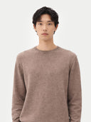 Men's Taupe Crewneck Cashmere Sweater worn by model, detail view on white background