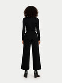 Women's Wide-Leg Cashmere Pants Black worn by model, back view on white background