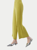 Women's Rib-Knit Silk Cashmere Blend Pants Dark Citron worn by model, side view on white background