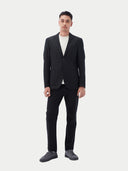 Men's Black single-breasted cashmere blazer worn by model front view on backround