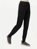 Women's Cashmere Cuffed Jogger Charcoal worn by model, side view on white background