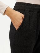 Women's Cashmere Cuffed Jogger Charcoal worn by model, detail view on white background