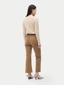 Essential Organic Cashmere Mock Neck Pullover Beige worn by model, back view, on white background