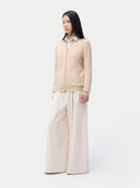 Cashmere Full-Zip Cardigan Beige worn by model, side view, on white background