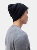 Cashmere Rib Knit Hat Black  worn by model, back view on white background