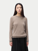 Cashmere Crewneck Sweater Taupe worn by model, detail view, on white background