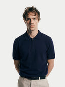 Men's Navy Cashmere Silk Half-Zip Polo Top worn by model, detail view on white background