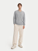Men's Grey Crewneck Cashmere Sweater worn by model, front view on white background