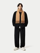 Cashmere Fringed Scarf Sheepskin  worn by model, front view on white background