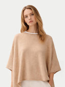 Women's Beige Cashmere  Knitted Poncho worn by model, detail view, on white background