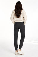 Women's Cashmere Cuffed Jogger Charcoal worn by model, back view on white background