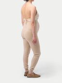 Over Bump Maternity Cashmere Knit Pants Beige worn by model, back view on white background