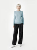 Women's Cloud Blue Cashmere Crewneck Sweate worn by model, front view on white background