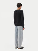 Men's Black Crewneck Cashmere Sweater worn by model, back view on white background