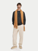 Cashmere Fringed Scarf Almond worn by model, front view on white background