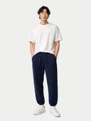 Men's Cashmere India ink Sweatpants worn by model, front view on white background
