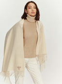 Women's Cashmere Woven Scarf Beige worn by model, detail view on white background