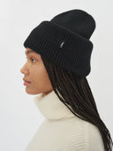 Unisex Cashmere Ribbed Chunky Beanie Black worn by model, side view on white background