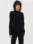 Women's Black Cashmere Full-Zip Cardigan worn by model, detail view on white background