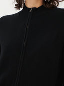 Women's Black Cashmere Full-Zip Cardigan worn by model, detail view on white background