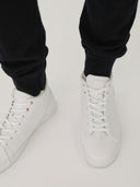 Men's Cashmere Jogger Black worn by model, detail view on white background